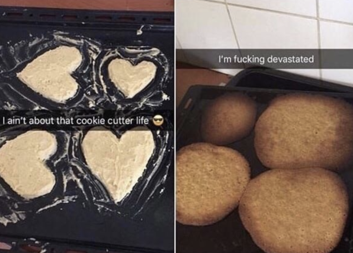 A person attempting to make heart-shaped cookies but they just turned out to be blobs