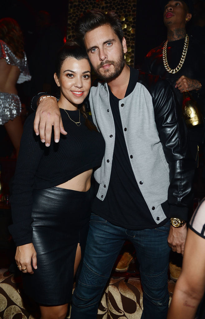 Kourtney Kardashian, in a crop top and skirt, and Scott Disick celebrate Kim Kardashian&#x27;s 33rd birthday in 2013