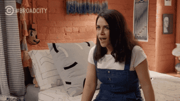 Abbi blinks and stares in shock on Broad City