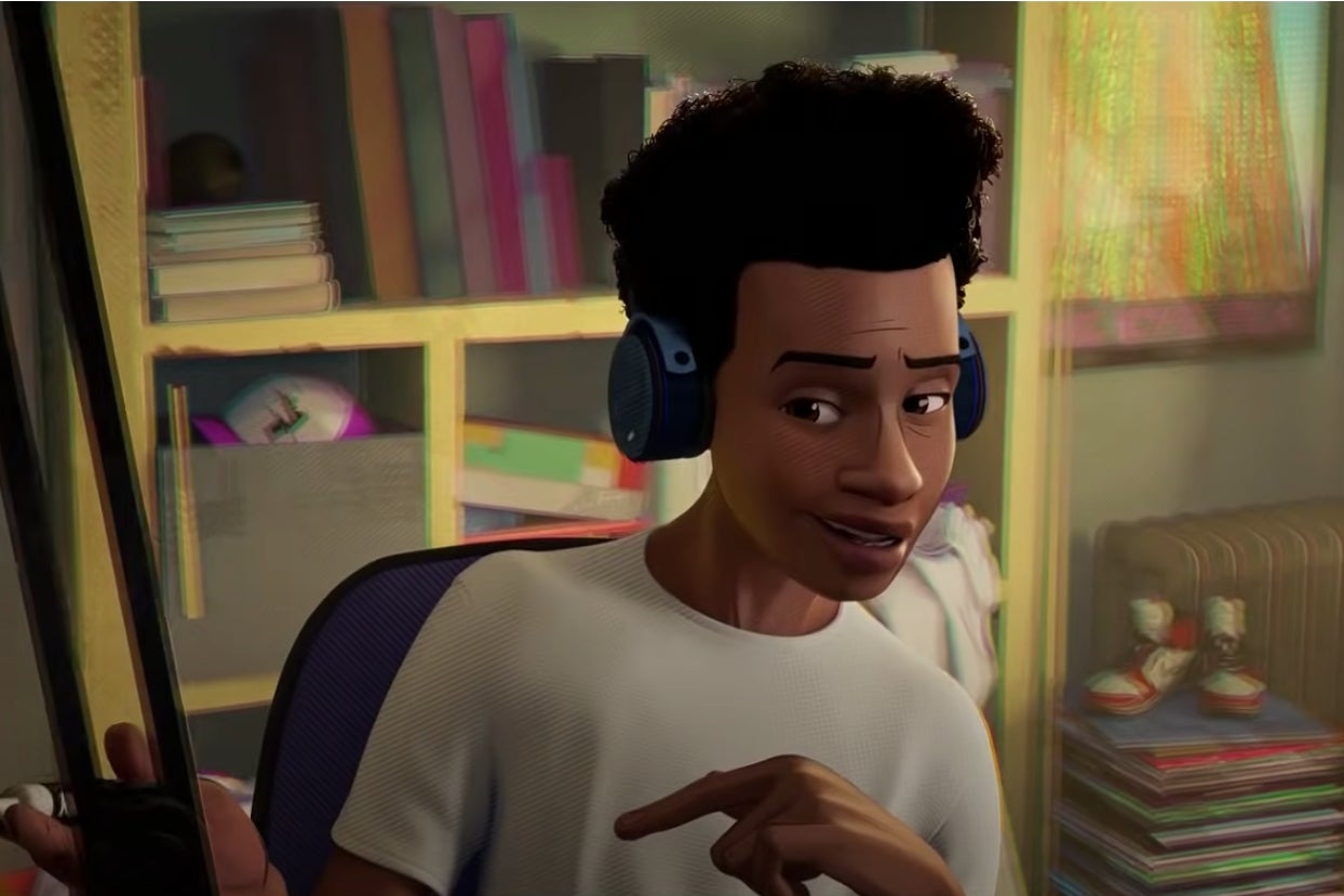 Miles smiling and singing