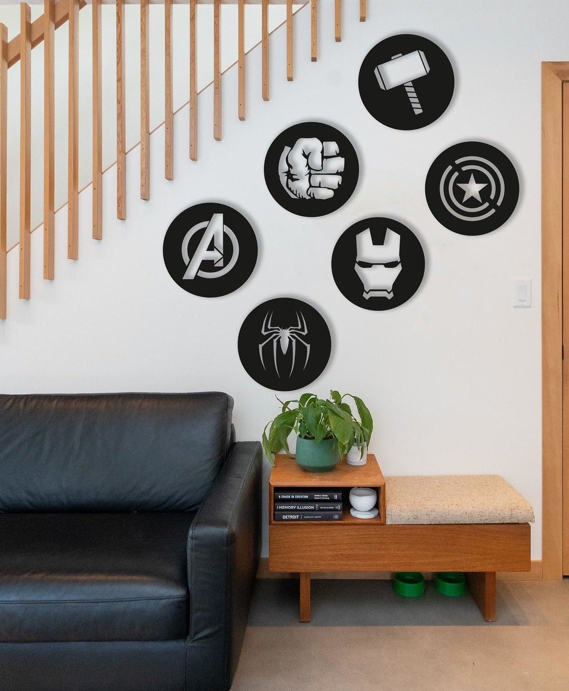 The six decor pieces hanging on a wall