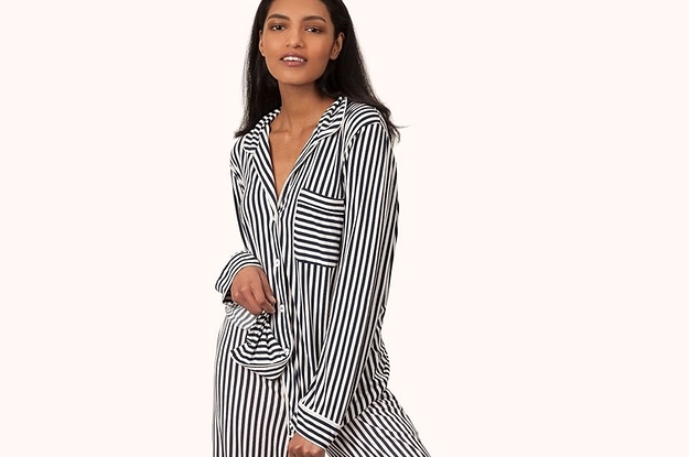 front shot of model wearing lounge pants in black pinstripe