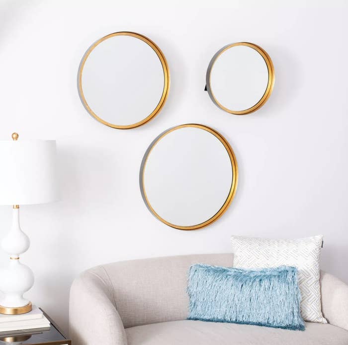 Three mirrors with gold frames