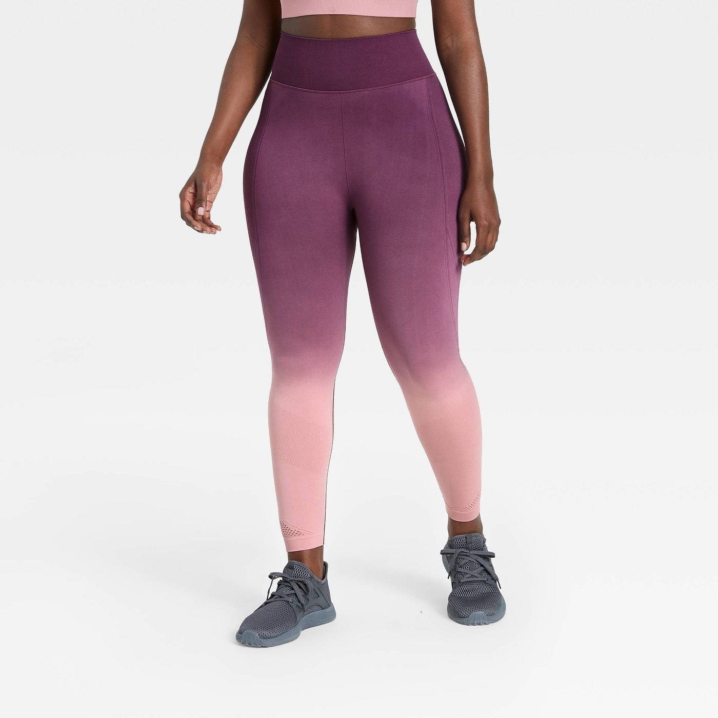 model  wearing purple ombre leggings