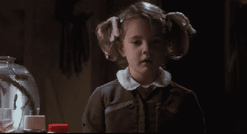 Drew Barrymore in &quot;E.T.&quot; saying &quot;what&#x27;s happening&quot; 