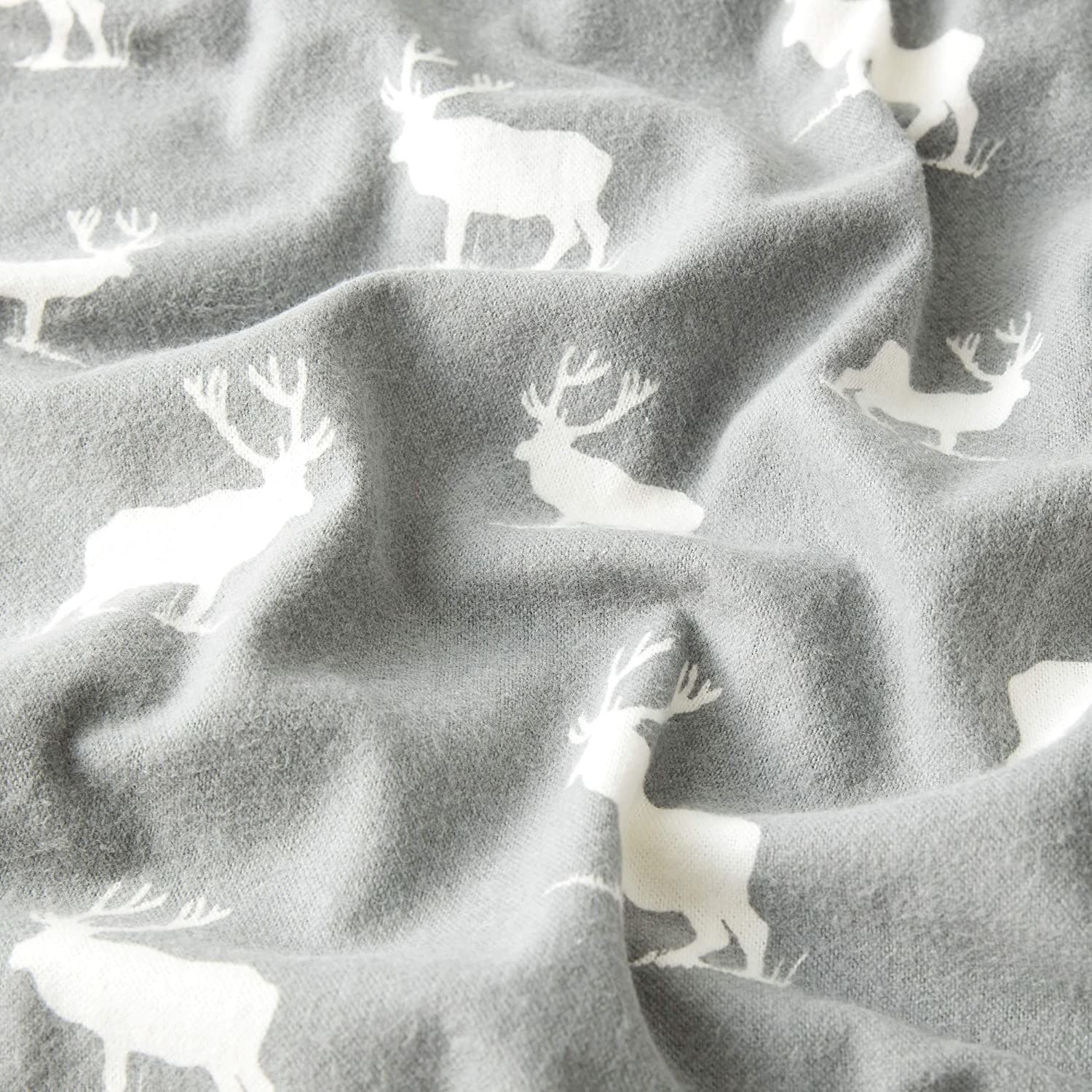 Closeup of sheets with elk pattern 
