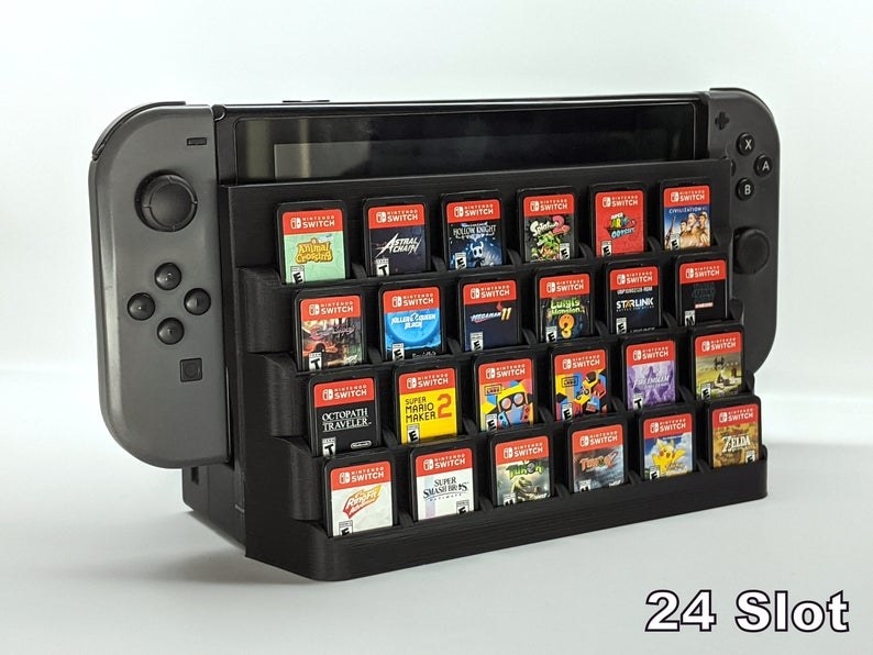 Cartridge case attached to Nintendo Switch dock with 24 games inserted