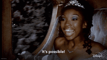 a gif of brandy as cinderella singing &quot;it&#x27;s possible!&quot;