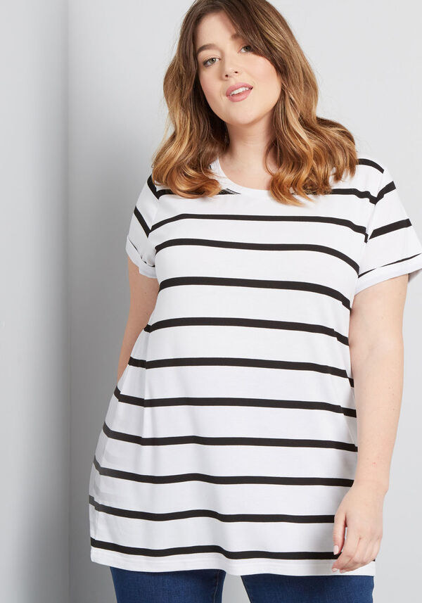 model in white tee with black stripes