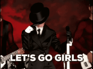 a gif of shania twain saying &quot;let&#x27;s go girls&quot;
