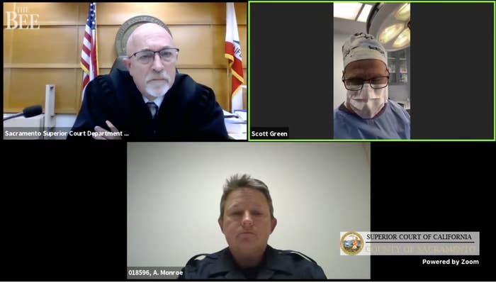 A police officer, court judge, and surgeon wearing a face mask and scrubs all appear in separate windows in a Zoom videoconference call