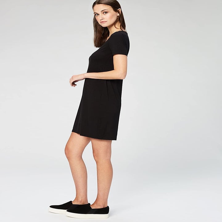 model wearing the black mini dress 