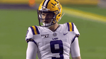 Yellow helmet with a purple &quot;LSU&quot; and a tiger head