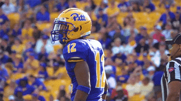 Yellow helmet with blue word &quot;Pitt&quot; in cursive