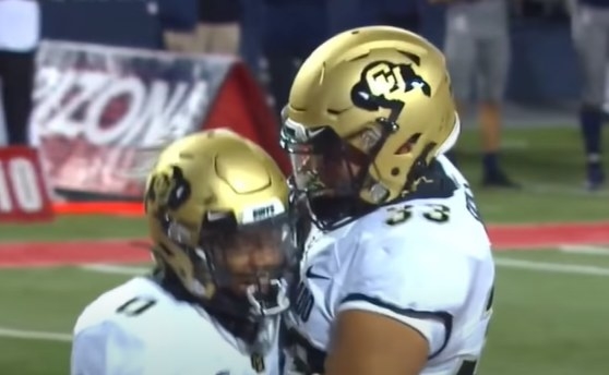 Gold helmet with a black buffalo logo with the gold letters &quot;CU&quot; inside of it