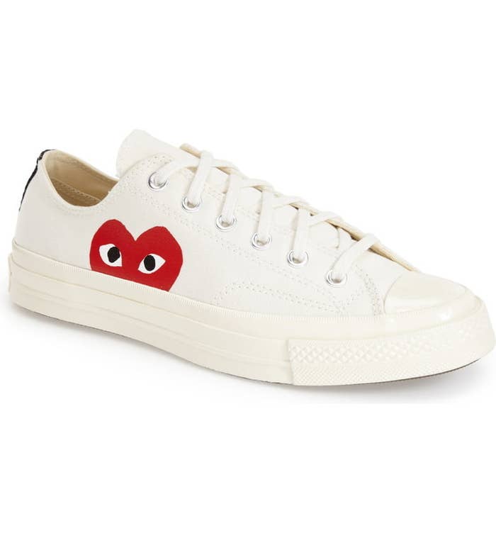 white comme des garcons x converse low top sneaker with red heart