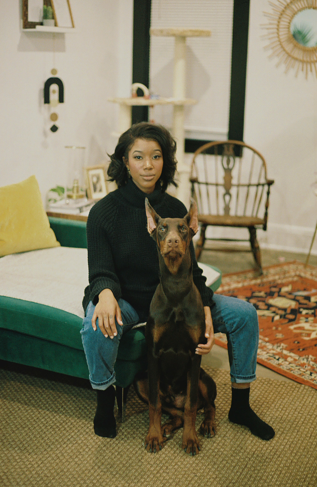 A stylish woman and a dog