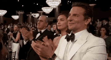Bradley Cooper at the 2019 Golden Globes, giving a standing ovation