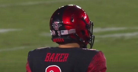 A reflective red helmet with a thick black stripe down the middle (San Diego State logo on the back)
