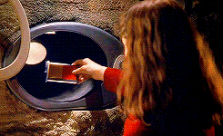 Carmen putting a pack in the microwave in Spy Kids
