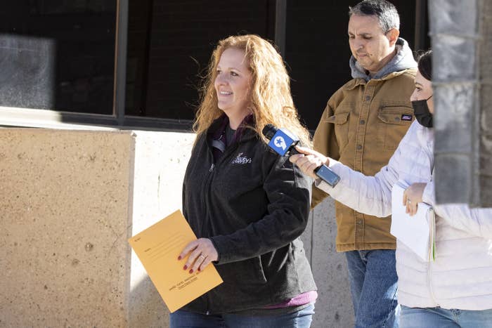 Cudd smiles as she leaves the courthouse 