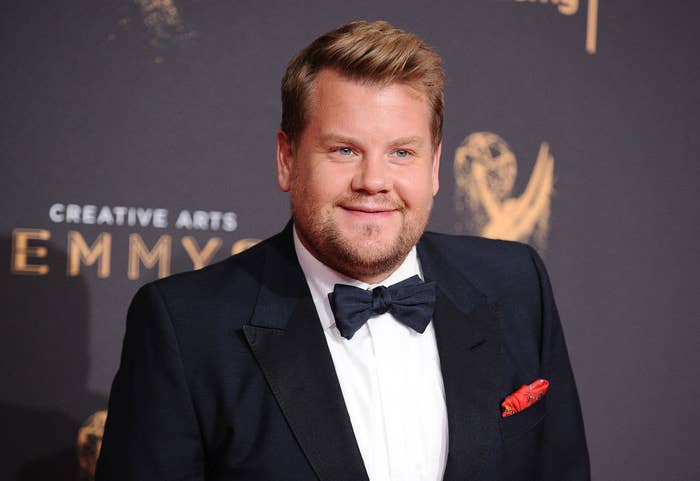 James Corden posing in a tux at the Creative Emmy awards show