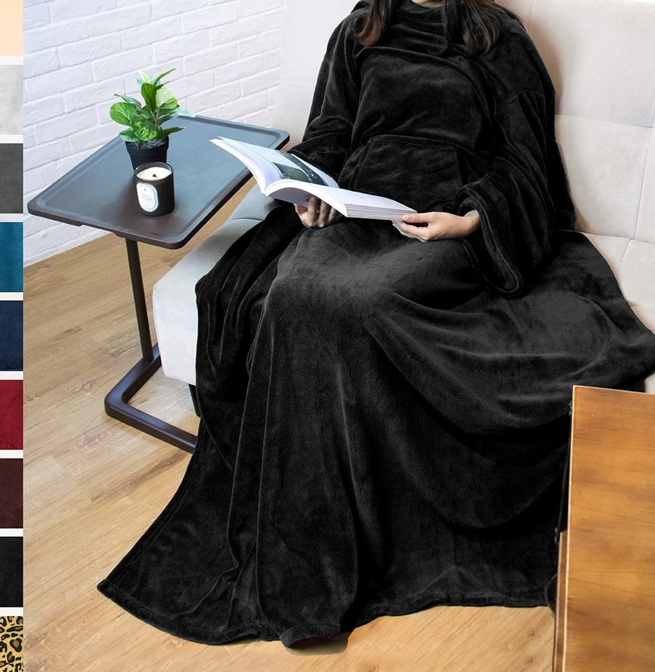 The blanket robe worn by a model sitting and reading