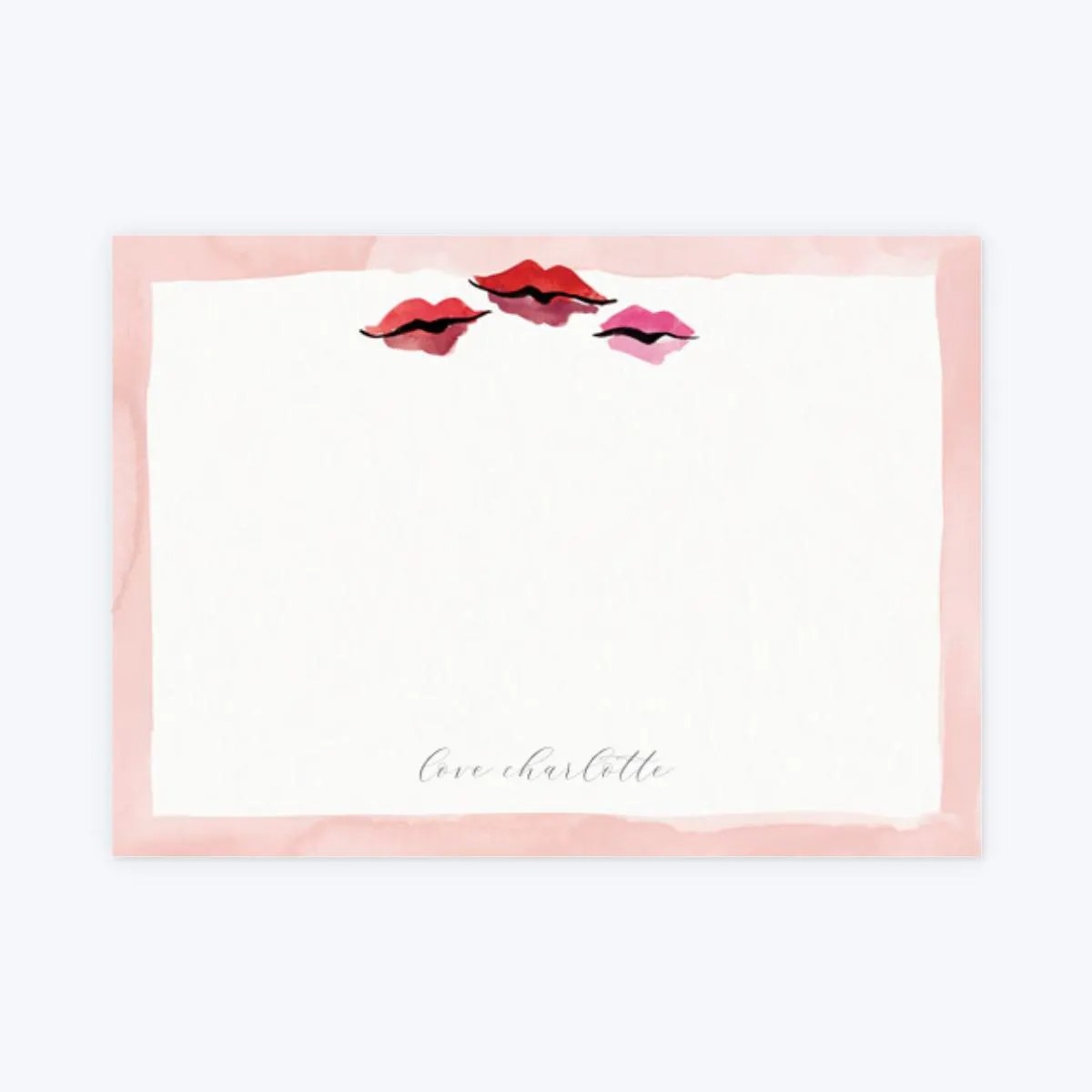 A card with a pink border, three lip doodles at the top, and the words &quot;love charlotte&quot; at the bottom