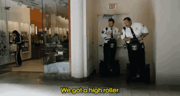 Paul Blart on his scooter, saying &quot;We got a high roller.&quot;