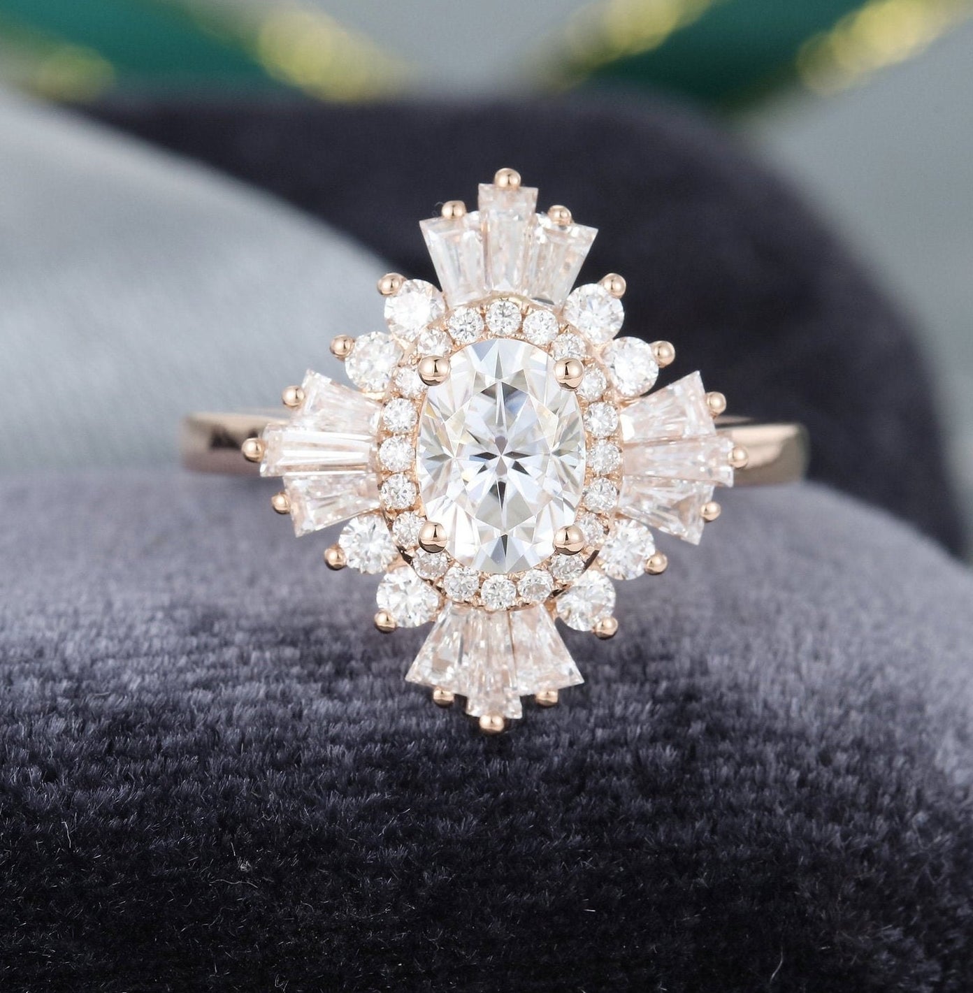 the oval ring with rectangular diamonds around it