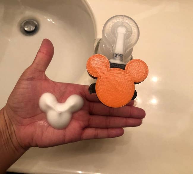 mickey mouse pump attachment that helps create mouse shaped foam 