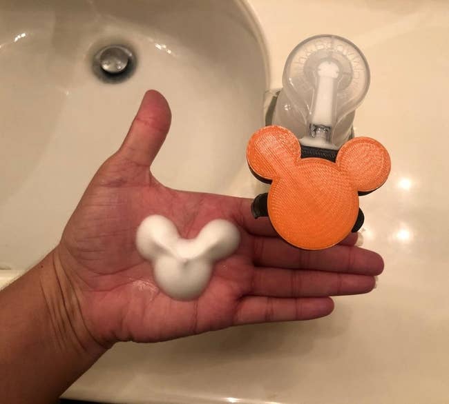 mickey mouse pump attachment that helps create mouse shaped foam 