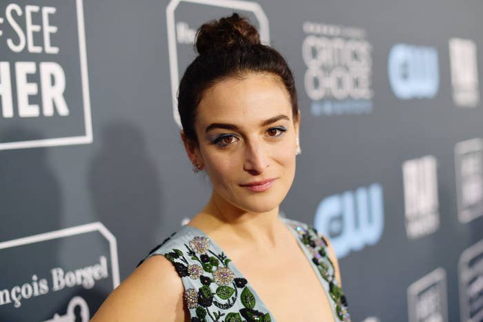 Jenny Slate wears her hair in a bun and a dress on the red carpet at the Critics&#x27;s Choice Awards