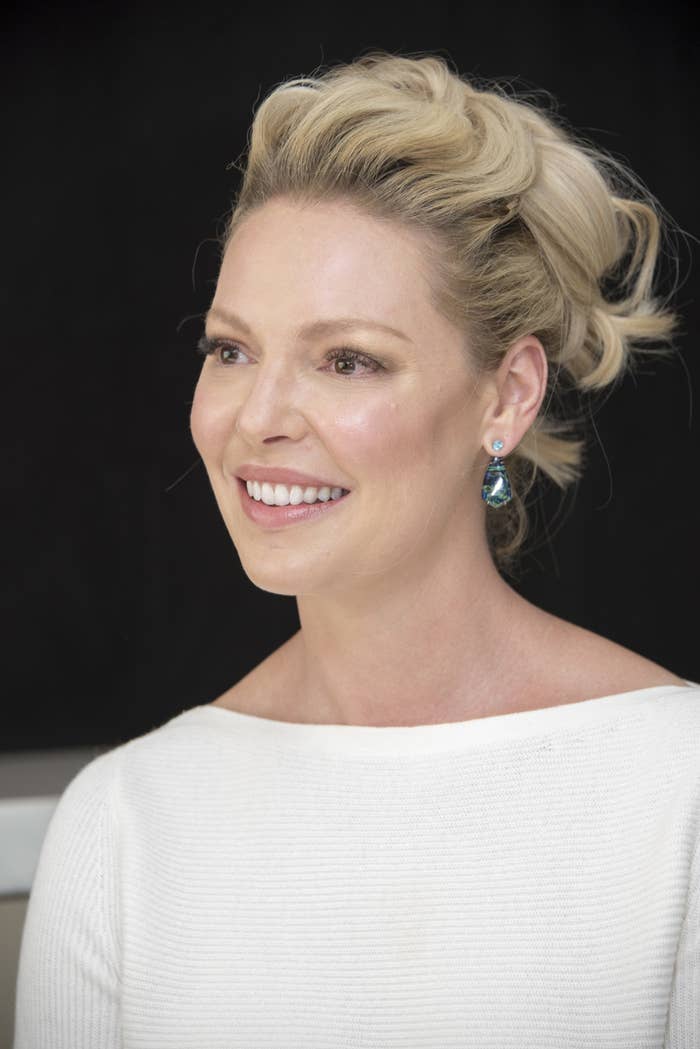 Katherine Heigl smiles at a press conference for Suits in 2018 
