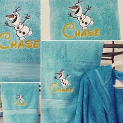 an embroidered towel with a name a print of Olaf