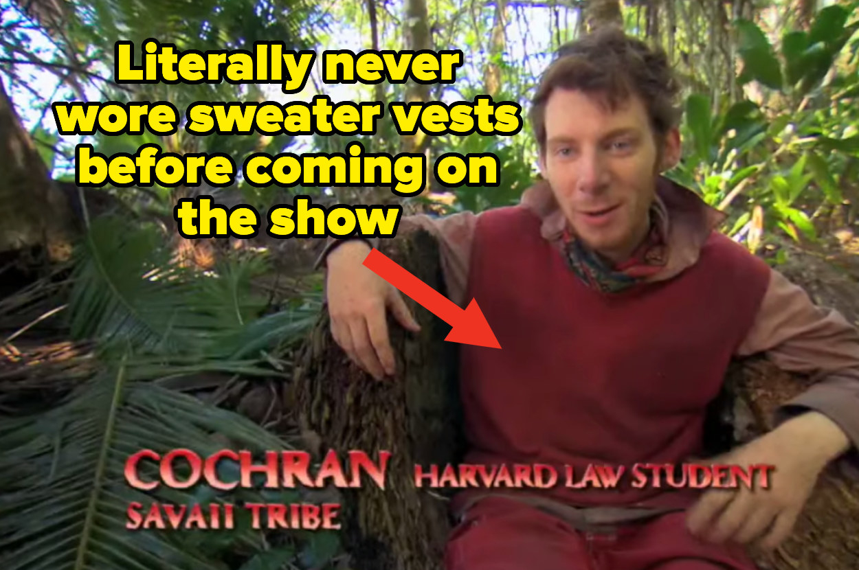 Survivor contestant Cochran giving a confessional in a red sweater vest with the text &quot;literally never wore sweater vests before coming on the show&quot;