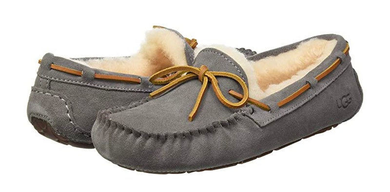 pair of grey Ugg moccasin slippers lined with wool