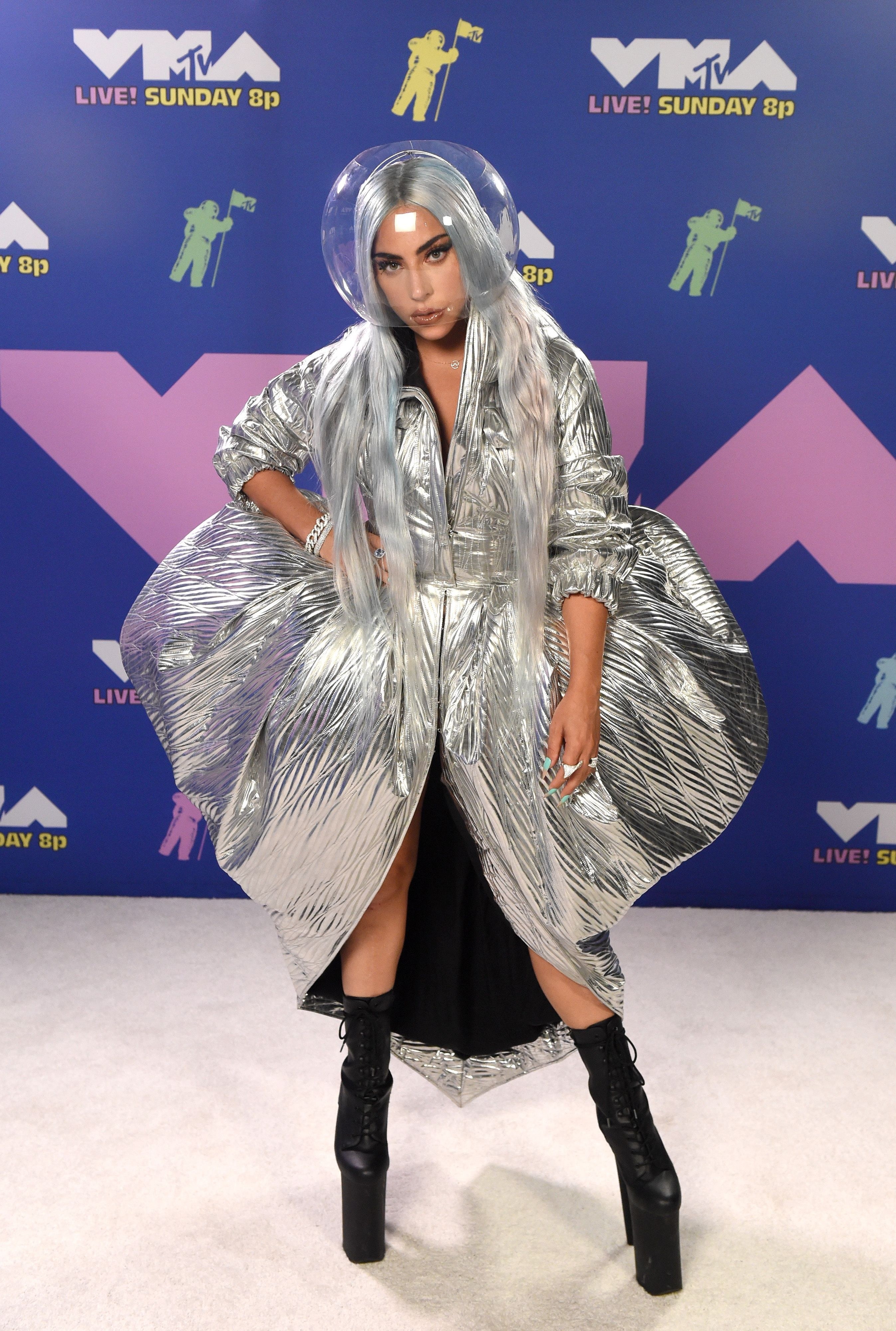 Lady Gaga wearing a fishbowl on her head and a blooming dress at the 2020 MTV Video Music Awards