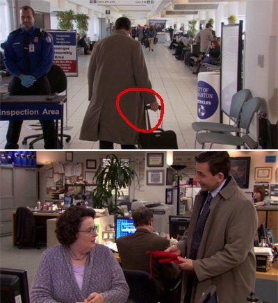Michael Scott walking through the airport with a string of yarn hanging out of his pocket 