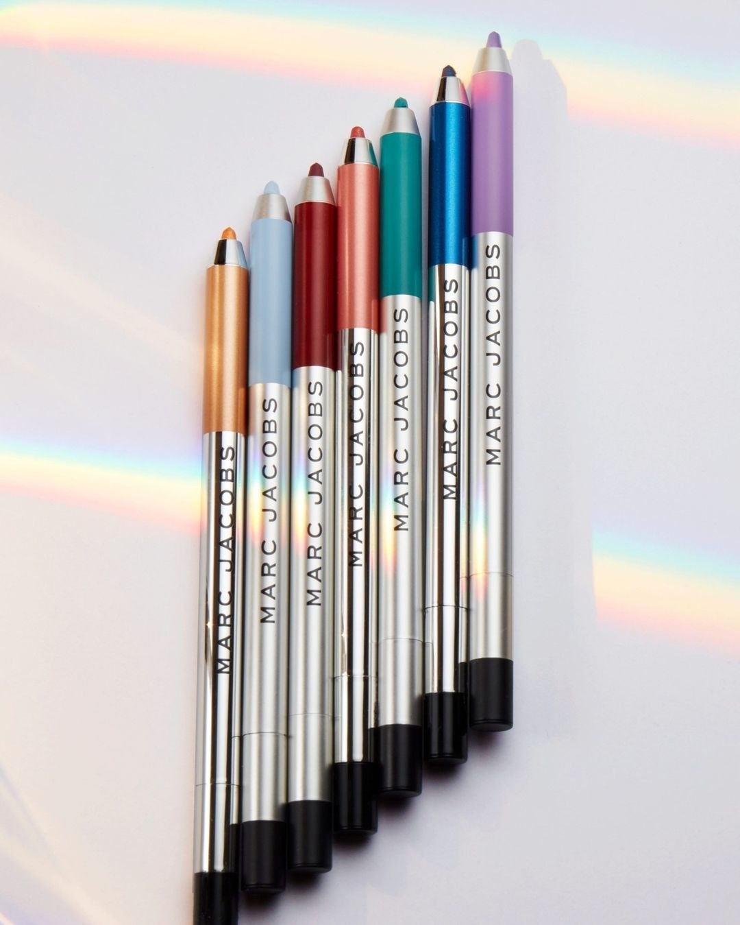 Seven eye pencils in a row