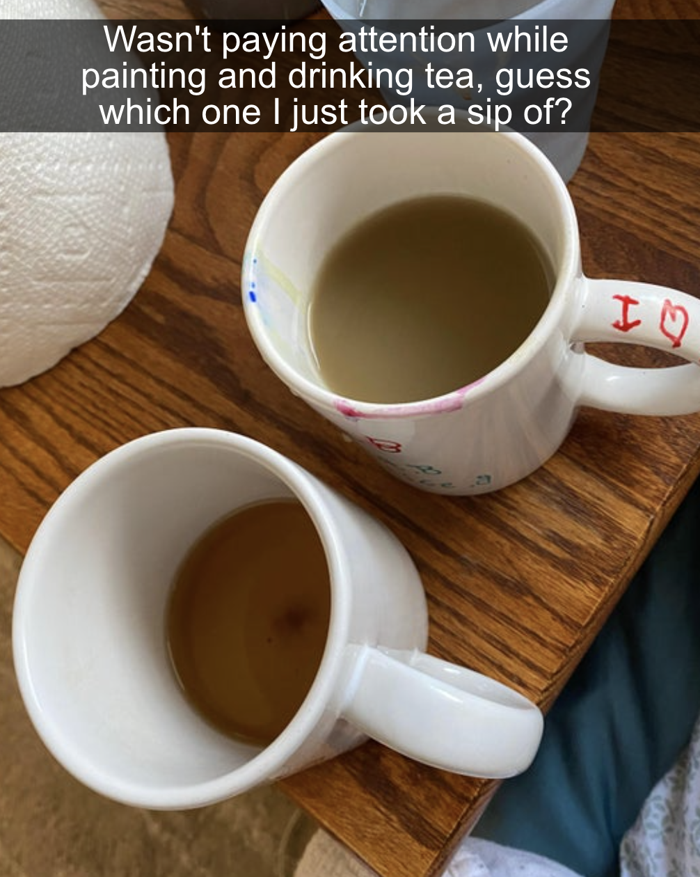 person who had two cups one coffee one for painting and they drank the paint