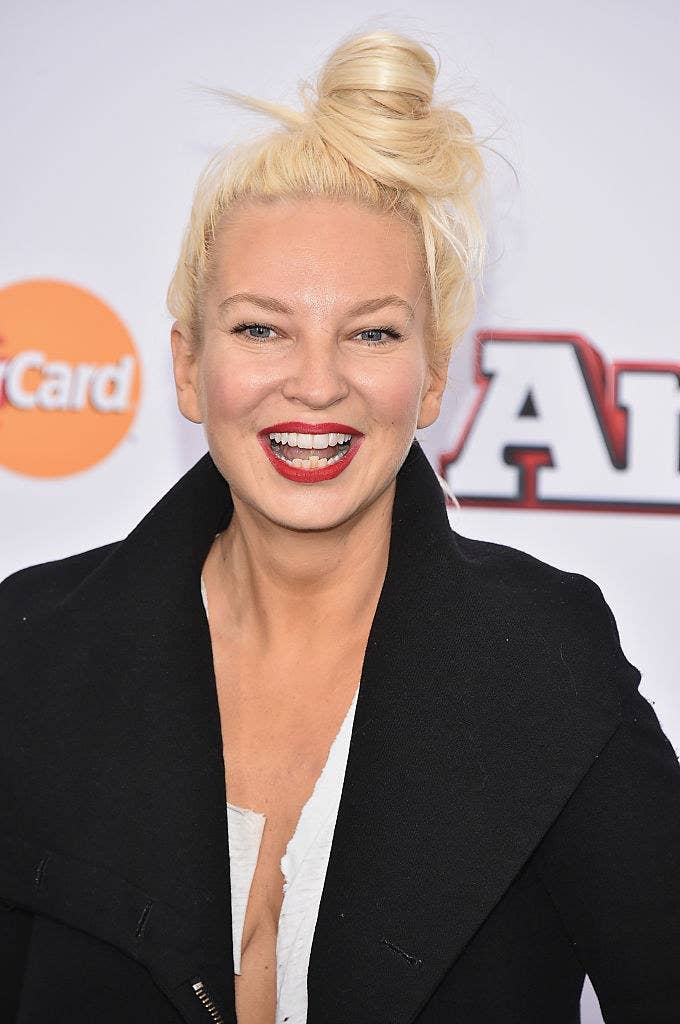 Allison smiling on a red carpet