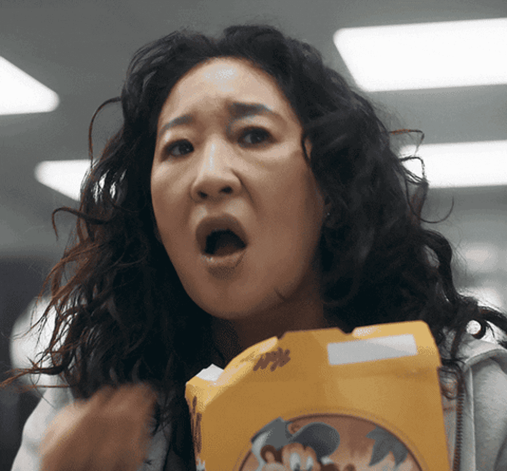 Eve from &quot;Killing Eve&quot; throwing a handful of cereal in her mouth