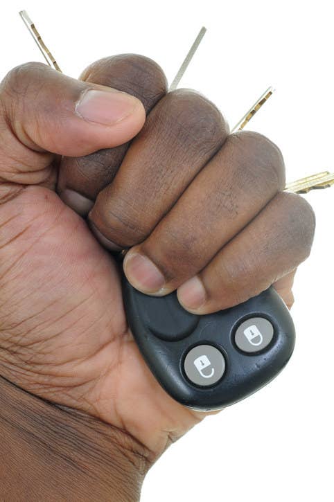 woman holding keys in her fist