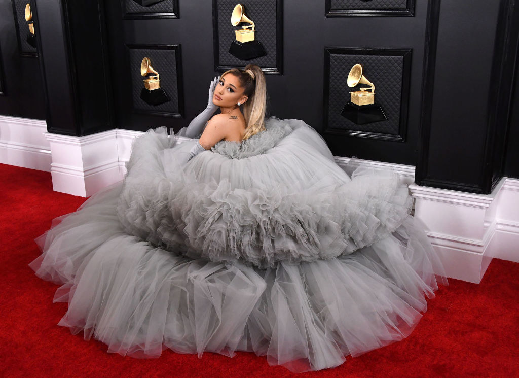 Ariana is wearing a huge gray gown at the grammys