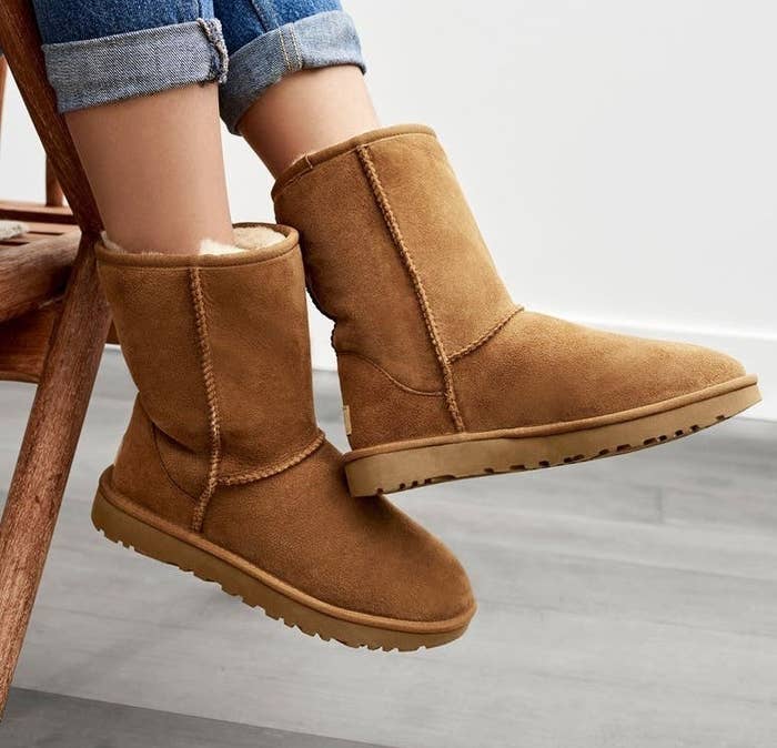 A model wearing the boots in Chestnut Suede