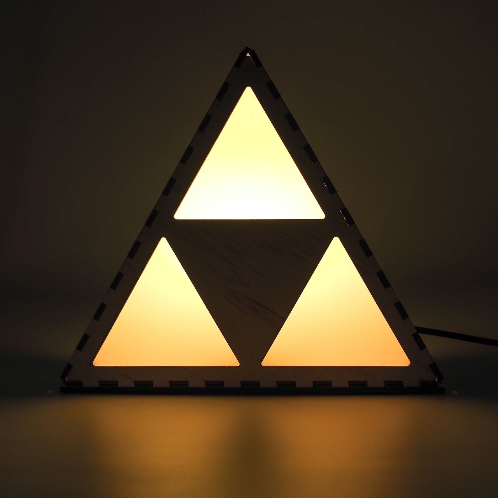 a light shaped like the triforce from zelda