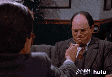 George from Seinfeld shaking his head when offered food.
