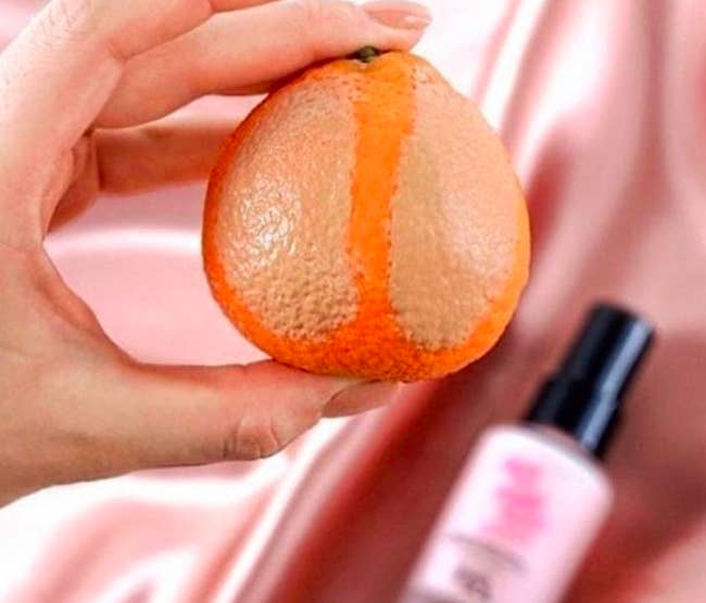 An orange with and without the Touch in Sol No Poreblem primer applied under foundation