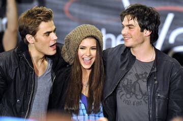 Paul Wesley (L), Nina Dubrev (M) and Ian Somerhalder (R) at &#x27;The Vampire Diaries&#x27; Hot Topic tour in Canoga Park, California, in February 2010